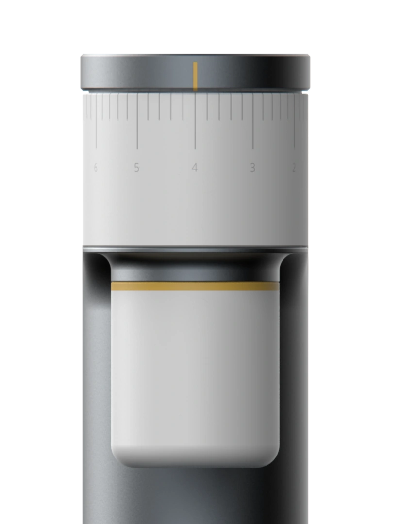 Close-up of the grinder's front: the dial and its printed scale above, the dosing container below.